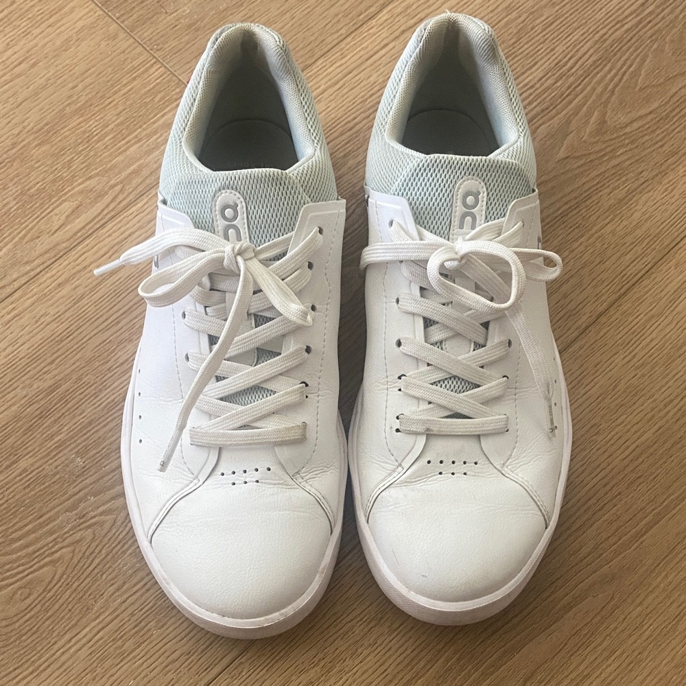 On White Athletic Shoes The Roger